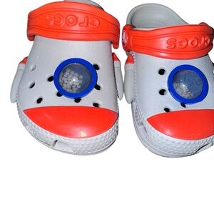 CROCS Kids' White and Orange Clogs with Blue Accents